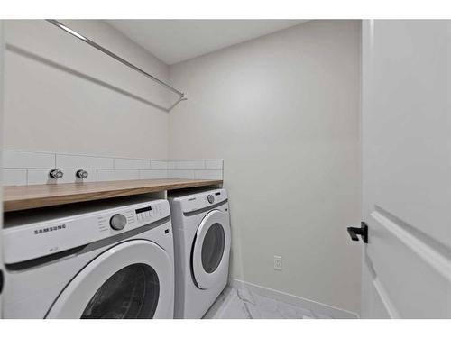 41 Corner Glen Road Ne, Calgary, AB - Indoor Photo Showing Laundry Room