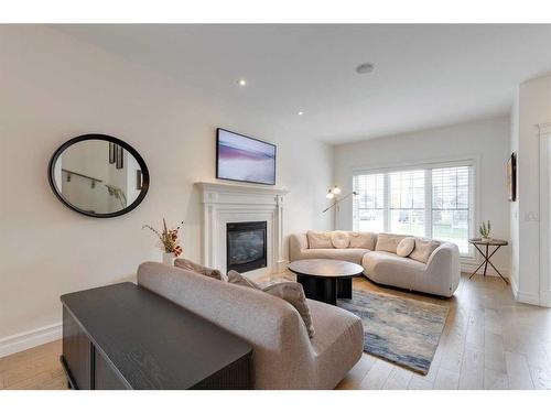 2201 31 Street Sw, Calgary, AB - Indoor Photo Showing Living Room With Fireplace