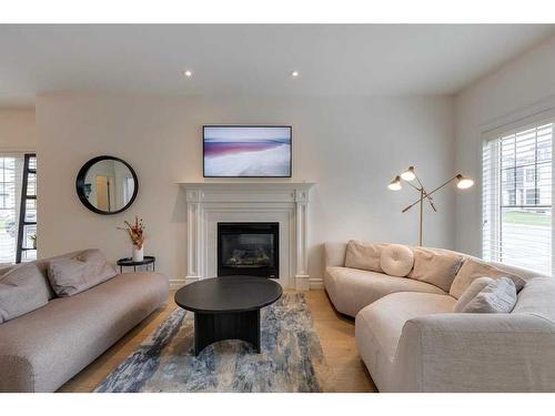 2201 31 Street Sw, Calgary, AB - Indoor Photo Showing Living Room With Fireplace