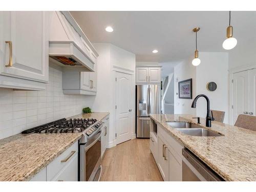 2201 31 Street Sw, Calgary, AB - Indoor Photo Showing Kitchen With Stainless Steel Kitchen With Double Sink With Upgraded Kitchen