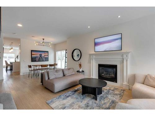 2201 31 Street Sw, Calgary, AB - Indoor Photo Showing Living Room With Fireplace