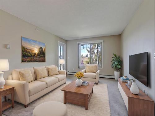 320-428 Chaparral Ravine View Se, Calgary, AB - Indoor Photo Showing Living Room