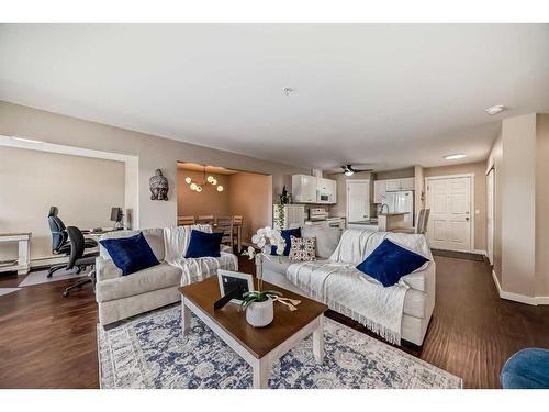 307-270 Shawville Way Se, Calgary, AB - Indoor Photo Showing Living Room