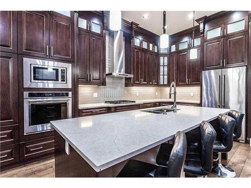 602 22 Avenue Ne, Calgary, AB - Indoor Photo Showing Kitchen With Stainless Steel Kitchen With Double Sink With Upgraded Kitchen