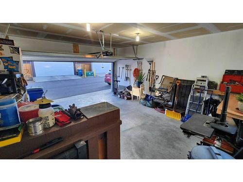 389 Midtown Gate Sw, Airdrie, AB - Indoor Photo Showing Garage