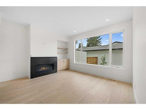 1417 41 Street Sw, Calgary, AB - Indoor Photo Showing Living Room With Fireplace