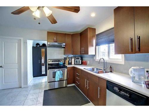 6152 Bowwood Drive Nw, Calgary, AB - Indoor Photo Showing Kitchen With Double Sink