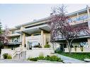 310-108 Edgeridge Terrace Nw, Calgary, AB  - Outdoor With Balcony With Facade 