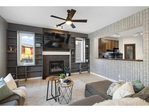 38 Sage Valley Manor Nw, Calgary, AB - Indoor Photo Showing Living Room With Fireplace