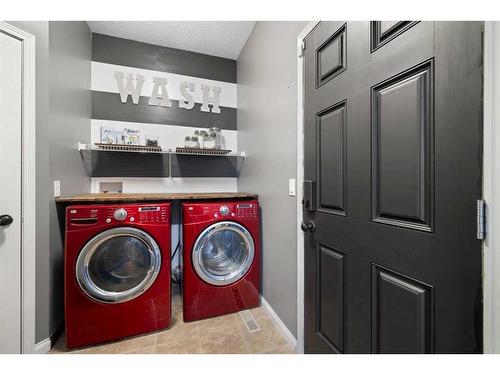 38 Sage Valley Manor Nw, Calgary, AB - Indoor Photo Showing Laundry Room