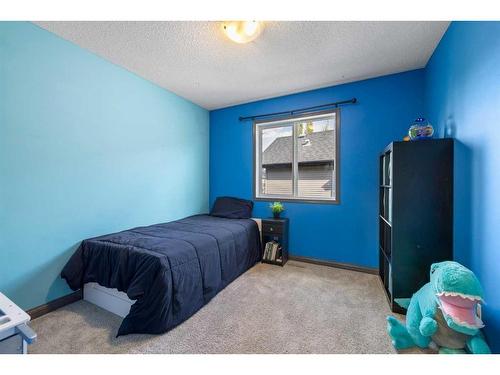 38 Sage Valley Manor Nw, Calgary, AB - Indoor Photo Showing Bedroom