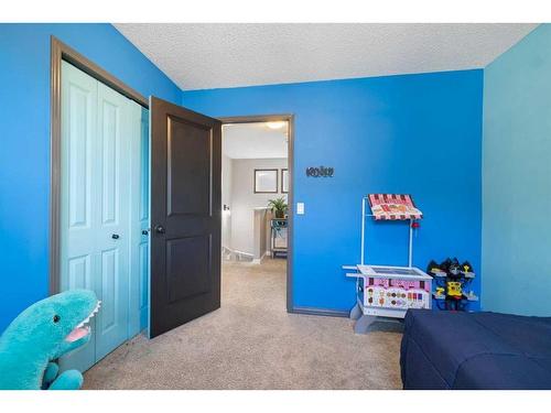 38 Sage Valley Manor Nw, Calgary, AB - Indoor Photo Showing Bedroom