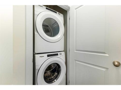 479 Canals Crossing, Airdrie, AB - Indoor Photo Showing Laundry Room