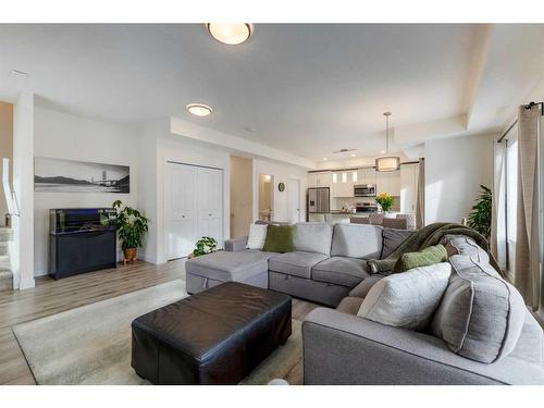 479 Canals Crossing, Airdrie, AB - Indoor Photo Showing Living Room With Fireplace