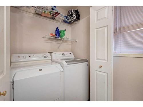 205 Somerset Drive Sw, Calgary, AB - Indoor Photo Showing Laundry Room