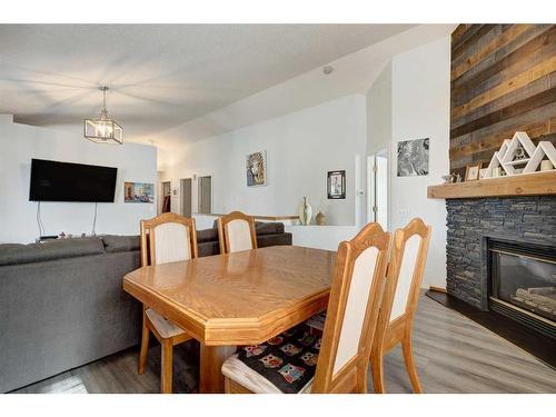 205 Somerset Drive Sw, Calgary, AB - Indoor With Fireplace