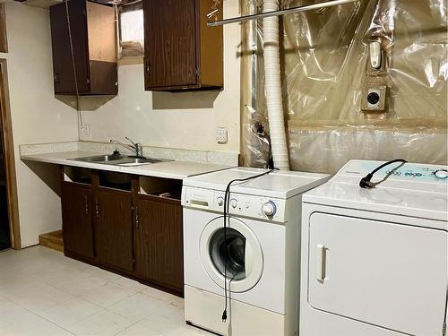 199 Penmeadows Close Se, Calgary, AB - Indoor Photo Showing Laundry Room