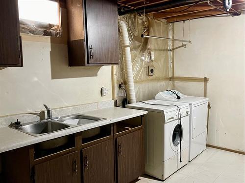 199 Penmeadows Close Se, Calgary, AB - Indoor Photo Showing Laundry Room