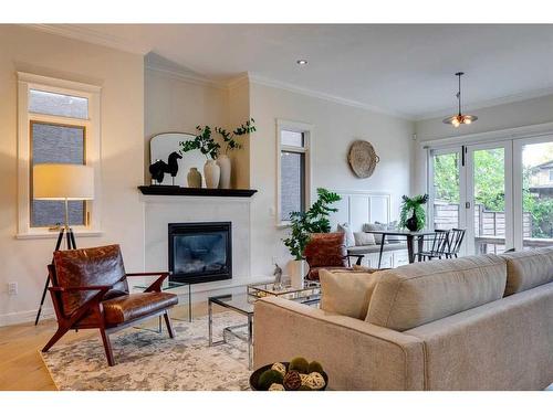 2407 27 Street Sw, Calgary, AB - Indoor Photo Showing Living Room With Fireplace