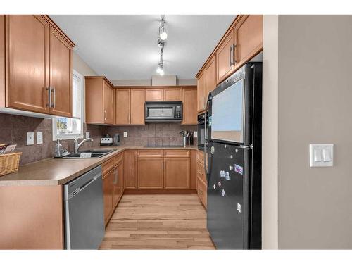 52 Royal Oak Lane Nw, Calgary, AB - Indoor Photo Showing Kitchen With Double Sink