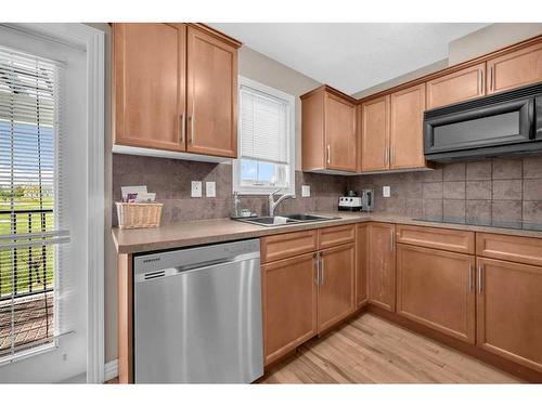 52 Royal Oak Lane Nw, Calgary, AB - Indoor Photo Showing Kitchen With Double Sink