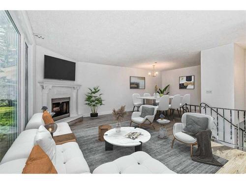 39 Bermuda Drive Nw, Calgary, AB - Indoor Photo Showing Living Room With Fireplace