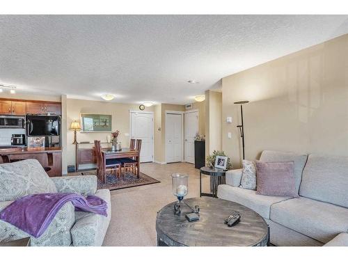 1208-450 Sage Valley Drive Nw, Calgary, AB - Indoor Photo Showing Living Room