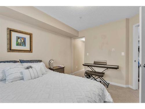 1208-450 Sage Valley Drive Nw, Calgary, AB - Indoor Photo Showing Bedroom