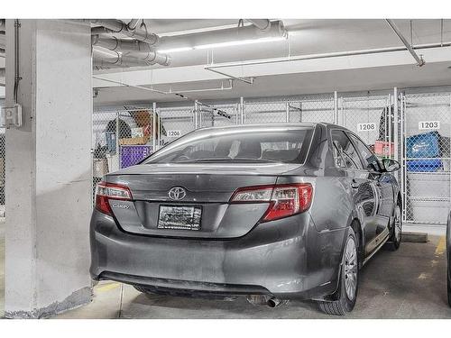 1208-450 Sage Valley Drive Nw, Calgary, AB - Indoor Photo Showing Garage