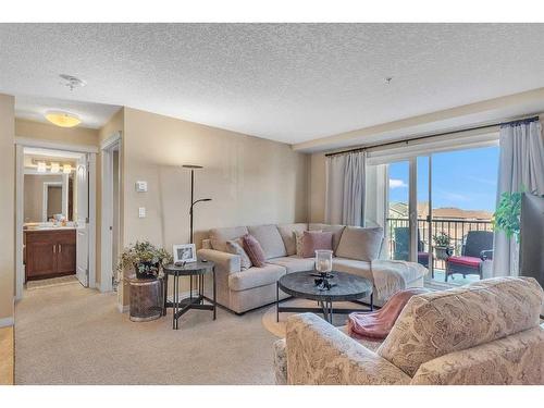 1208-450 Sage Valley Drive Nw, Calgary, AB - Indoor Photo Showing Living Room