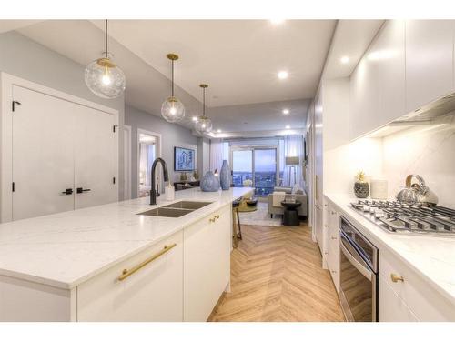 506-8505 Broadcast Avenue Sw, Calgary, AB - Indoor Photo Showing Kitchen With Double Sink With Upgraded Kitchen