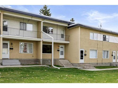 157-2211 19 Street Ne, Calgary, AB - Outdoor With Balcony With Facade