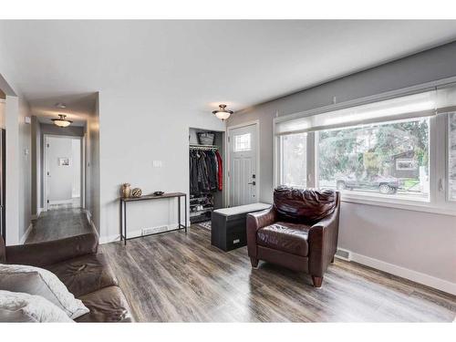 64 Healy Drive Sw, Calgary, AB - Indoor Photo Showing Living Room