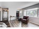 64 Healy Drive Sw, Calgary, AB  - Indoor Photo Showing Living Room 