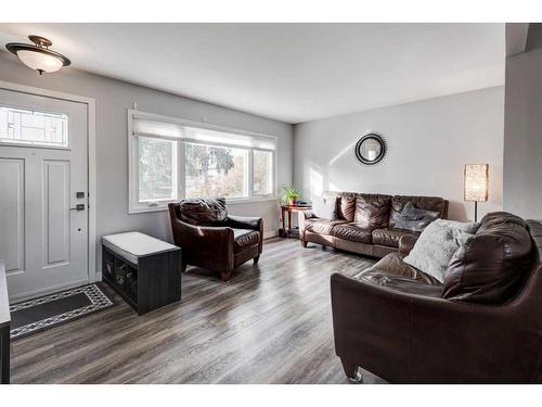 64 Healy Drive Sw, Calgary, AB - Indoor Photo Showing Living Room