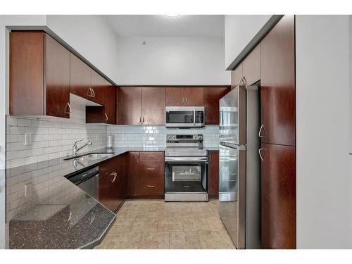 408-8880 Horton Road Sw, Calgary, AB - Indoor Photo Showing Kitchen With Stainless Steel Kitchen