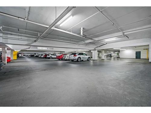 408-8880 Horton Road Sw, Calgary, AB - Indoor Photo Showing Garage