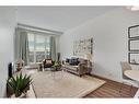 408-8880 Horton Road Sw, Calgary, AB  - Indoor Photo Showing Living Room 