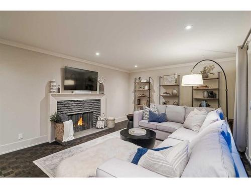 1412 70 Avenue Sw, Calgary, AB - Indoor Photo Showing Living Room With Fireplace