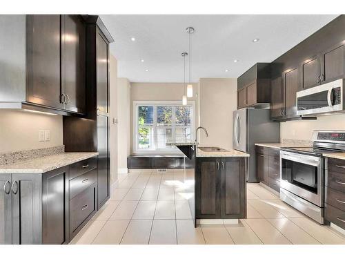 2801 Dallaire Avenue Sw, Calgary, AB - Indoor Photo Showing Kitchen With Upgraded Kitchen