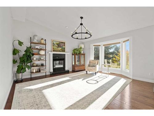 125 Aspen Way, Vulcan, AB - Indoor Photo Showing Living Room With Fireplace