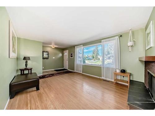 831 104 Avenue Sw, Calgary, AB - Indoor With Fireplace