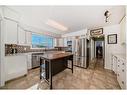 831 104 Avenue Sw, Calgary, AB  - Indoor Photo Showing Kitchen 