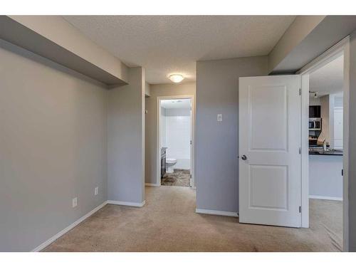 2310-1317 27 Street Se, Calgary, AB - Indoor Photo Showing Other Room