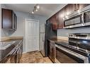 2310-1317 27 Street Se, Calgary, AB  - Indoor Photo Showing Kitchen With Stainless Steel Kitchen With Double Sink 