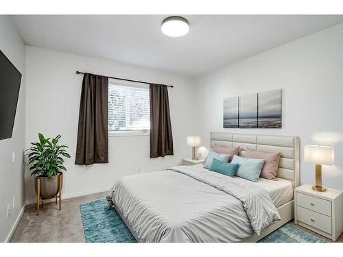 80 Douglas Ridge Circle Se, Calgary, AB - Indoor Photo Showing Bedroom