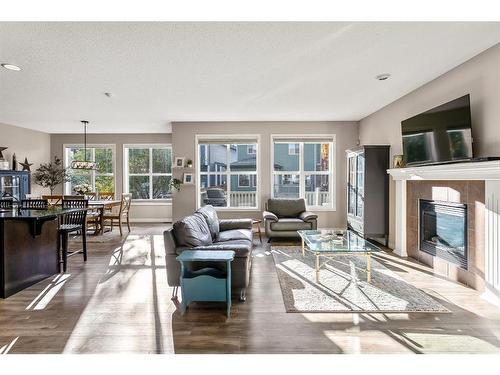 82 Chaparral Valley Grove Se, Calgary, AB - Indoor Photo Showing Living Room With Fireplace