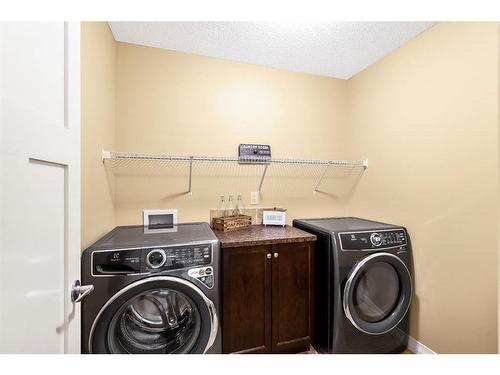 82 Chaparral Valley Grove Se, Calgary, AB - Indoor Photo Showing Laundry Room