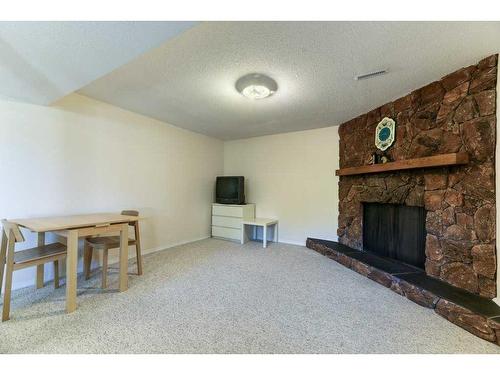 1828 Lysander Crescent Se, Calgary, AB - Indoor With Fireplace