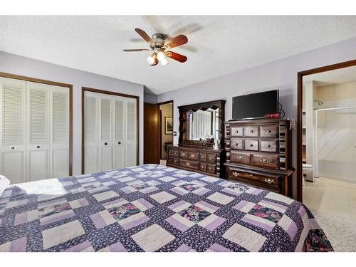 171 Mckenna Way Se, Calgary, AB - Indoor Photo Showing Bedroom